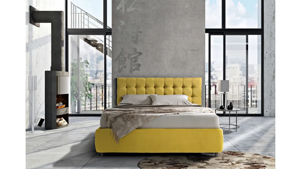 Letto in tessuto giallo con giroletto Eden di Artigianaletti