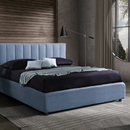 Letto in tessuto azzurro cielo con testiera imbottita Navajo di Artigianaletti