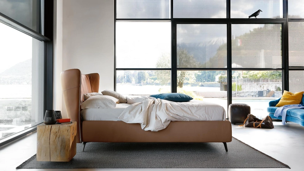 Letto in ecopelle con testiera curva Leonte di Noctis