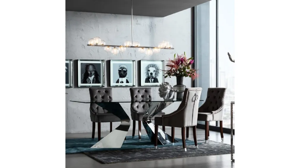 Tavolo Gloria con top in vetro e gambe in acciaio cromato di Kare Design