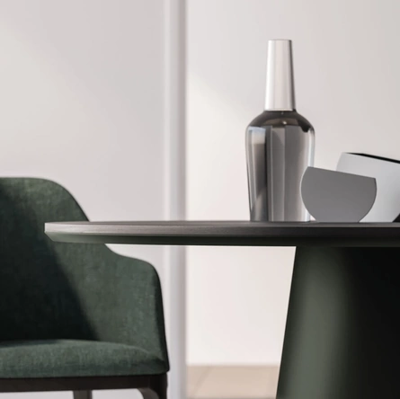 Tavolo rotondo Koni con top in melaminico materico Carbone di Orme